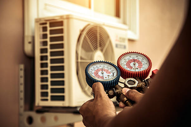 Professional Air Conditioning Service technician working in Solo, MO